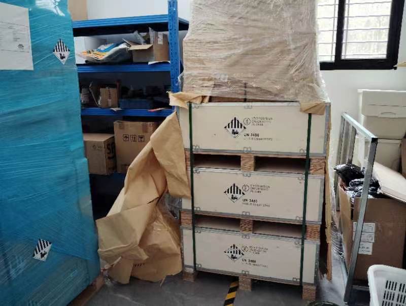 Cargo received and staged at the China warehouse before container loading
