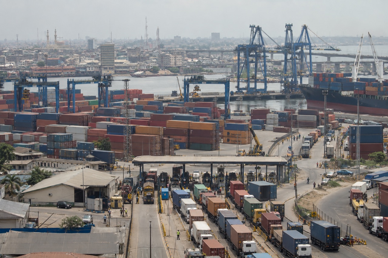 Illustrative image: container stacks, gantry cranes and queuing trucks at the Apapa container port in Lagos